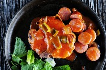 Pork Chop and Cajun Sausage Picante from Dine & Dish www.dineanddish.net