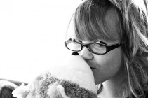 Girl Kissing Hallmark Jingle Stuffed Dog