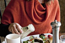 Woman Pouring Marzetti Salad Dressing